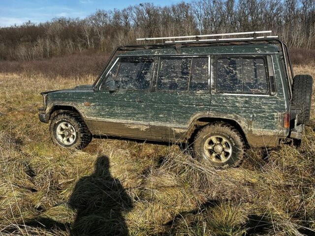 Зеленый Мицубиси Паджеро, объемом двигателя 2.5 л и пробегом 350 тыс. км за 4400 $, фото 3 на Automoto.ua