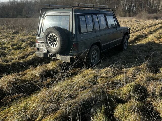 Зеленый Мицубиси Паджеро, объемом двигателя 2.5 л и пробегом 350 тыс. км за 4400 $, фото 4 на Automoto.ua