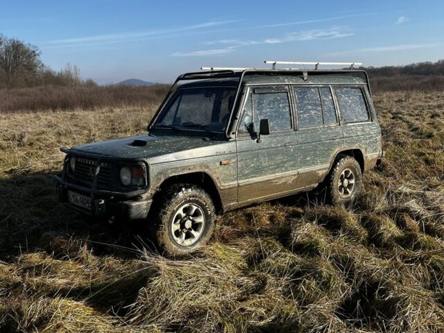 Зеленый Мицубиси Паджеро, объемом двигателя 2.5 л и пробегом 350 тыс. км за 4400 $, фото 1 на Automoto.ua
