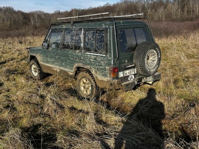 Зеленый Мицубиси Паджеро, объемом двигателя 2.5 л и пробегом 350 тыс. км за 4400 $, фото 5 на Automoto.ua