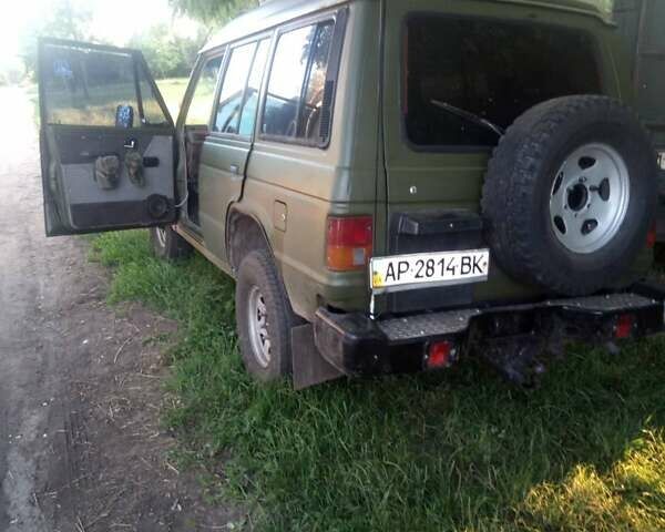 Зеленый Мицубиси Паджеро, объемом двигателя 2.5 л и пробегом 300 тыс. км за 4500 $, фото 1 на Automoto.ua