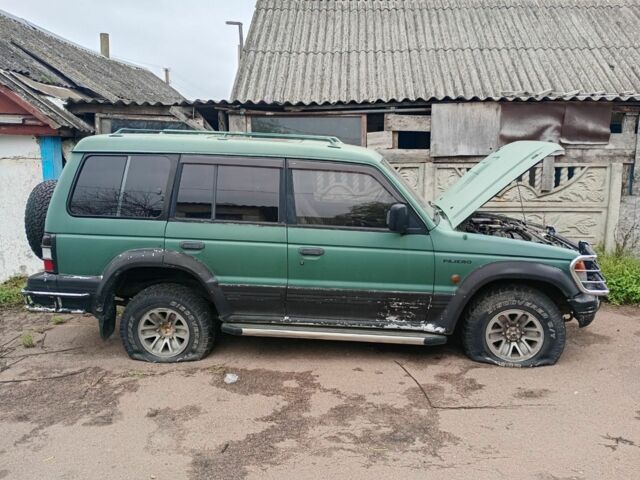 Зелений Міцубісі Паджеро, об'ємом двигуна 3 л та пробігом 428 тис. км за 4000 $, фото 10 на Automoto.ua