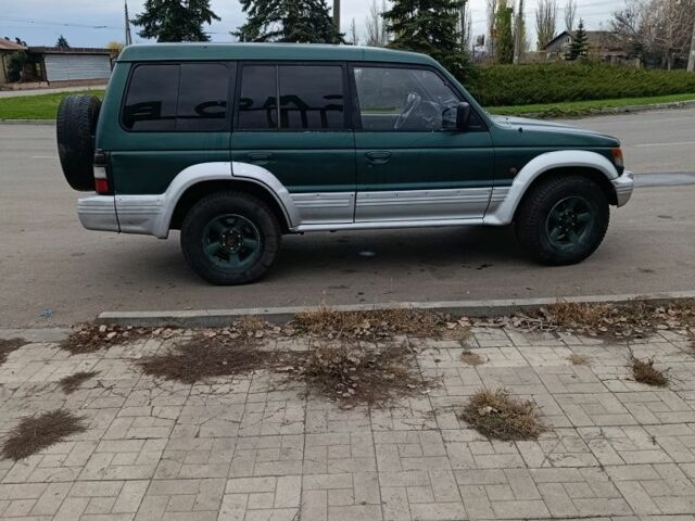 Зеленый Мицубиси Паджеро, объемом двигателя 2.5 л и пробегом 403 тыс. км за 5000 $, фото 2 на Automoto.ua