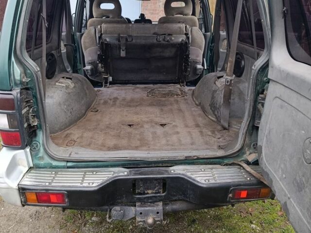 Зеленый Мицубиси Паджеро, объемом двигателя 2.5 л и пробегом 403 тыс. км за 5000 $, фото 6 на Automoto.ua