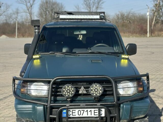 Зеленый Мицубиси Паджеро, объемом двигателя 2.5 л и пробегом 300 тыс. км за 7750 $, фото 1 на Automoto.ua