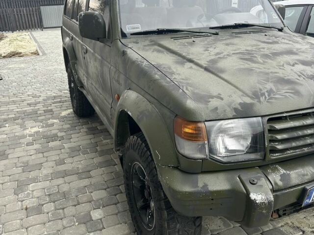 Зелений Міцубісі Паджеро, об'ємом двигуна 2.5 л та пробігом 450 тис. км за 3700 $, фото 1 на Automoto.ua