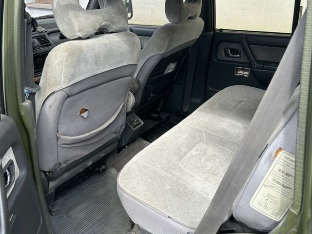 Зеленый Мицубиси Паджеро, объемом двигателя 2.5 л и пробегом 450 тыс. км за 3500 $, фото 6 на Automoto.ua