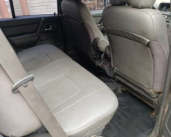 Зеленый Мицубиси Паджеро, объемом двигателя 2.8 л и пробегом 350 тыс. км за 5000 $, фото 5 на Automoto.ua