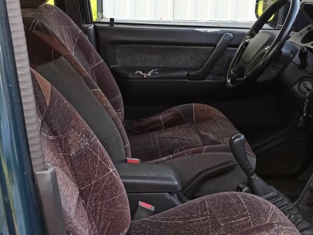 Зеленый Мицубиси Паджеро, объемом двигателя 2.8 л и пробегом 360 тыс. км за 5700 $, фото 13 на Automoto.ua