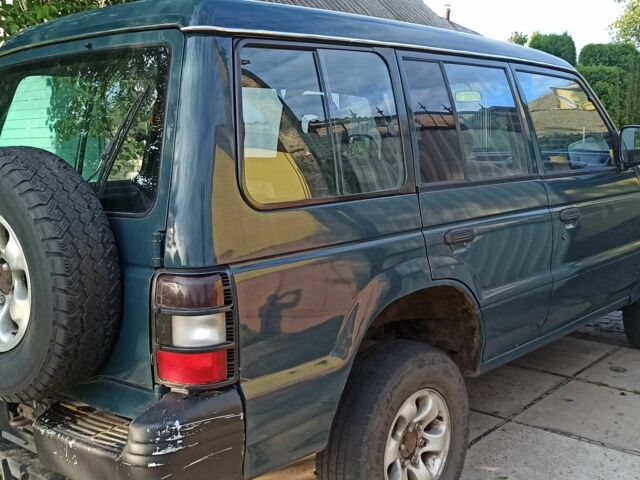 Зеленый Мицубиси Паджеро, объемом двигателя 2.8 л и пробегом 360 тыс. км за 5700 $, фото 18 на Automoto.ua