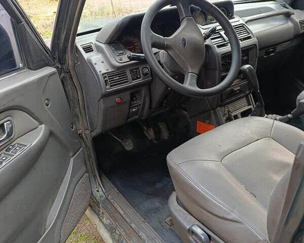 Зеленый Мицубиси Паджеро, объемом двигателя 2.8 л и пробегом 350 тыс. км за 5000 $, фото 4 на Automoto.ua