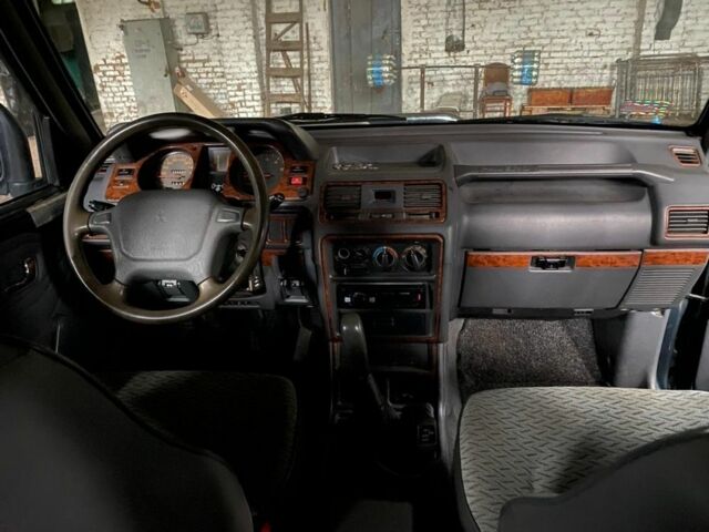 Зеленый Мицубиси Паджеро, объемом двигателя 2.8 л и пробегом 222 тыс. км за 6500 $, фото 4 на Automoto.ua