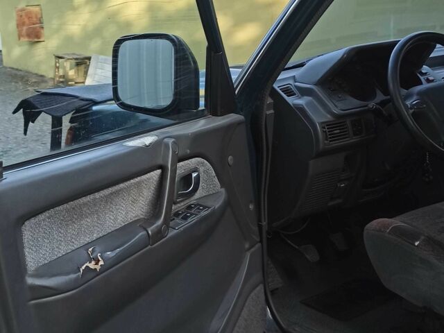 Зеленый Мицубиси Паджеро, объемом двигателя 2.8 л и пробегом 360 тыс. км за 5700 $, фото 7 на Automoto.ua