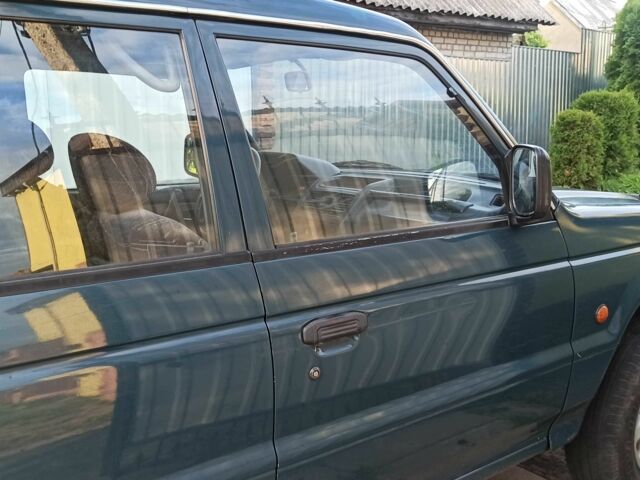 Зеленый Мицубиси Паджеро, объемом двигателя 2.8 л и пробегом 360 тыс. км за 5700 $, фото 16 на Automoto.ua