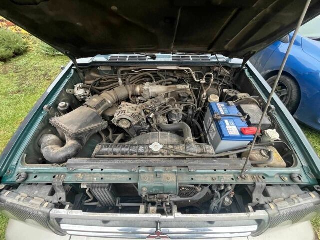 Зелений Міцубісі Паджеро, об'ємом двигуна 3 л та пробігом 197 тис. км за 5500 $, фото 14 на Automoto.ua