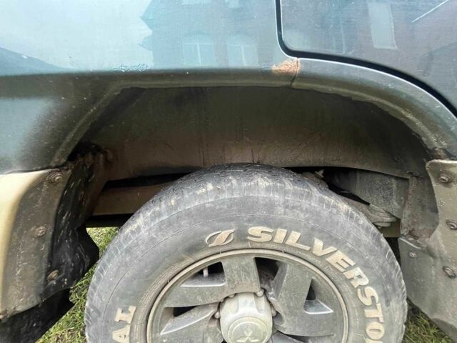 Зелений Міцубісі Паджеро, об'ємом двигуна 3 л та пробігом 197 тис. км за 5500 $, фото 8 на Automoto.ua