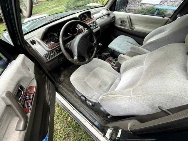 Зелений Міцубісі Паджеро, об'ємом двигуна 3 л та пробігом 197 тис. км за 5500 $, фото 3 на Automoto.ua