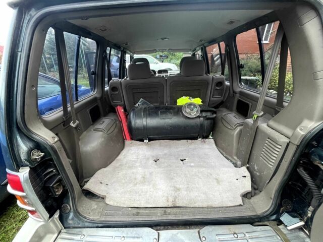 Зелений Міцубісі Паджеро, об'ємом двигуна 3 л та пробігом 197 тис. км за 5500 $, фото 5 на Automoto.ua