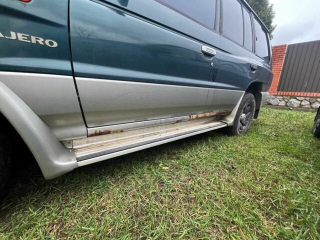 Зелений Міцубісі Паджеро, об'ємом двигуна 3 л та пробігом 197 тис. км за 5500 $, фото 12 на Automoto.ua