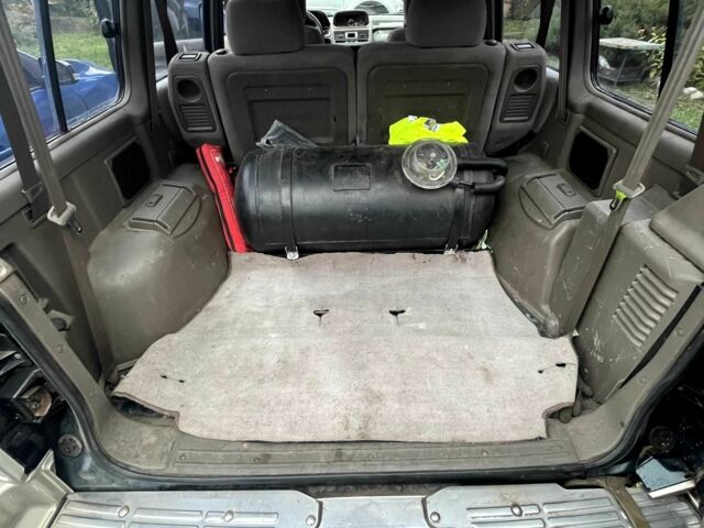 Зелений Міцубісі Паджеро, об'ємом двигуна 3 л та пробігом 197 тис. км за 5500 $, фото 4 на Automoto.ua