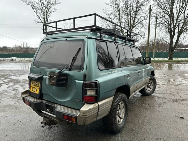 Зеленый Мицубиси Паджеро, объемом двигателя 2.8 л и пробегом 300 тыс. км за 4257 $, фото 3 на Automoto.ua
