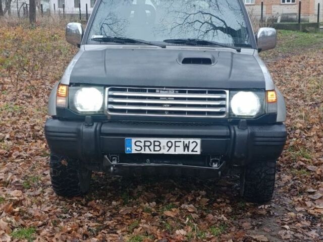 Зелений Міцубісі Паджеро, об'ємом двигуна 2 л та пробігом 350 тис. км за 3500 $, фото 12 на Automoto.ua