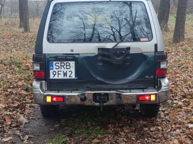 Зелений Міцубісі Паджеро, об'ємом двигуна 2 л та пробігом 350 тис. км за 3500 $, фото 15 на Automoto.ua