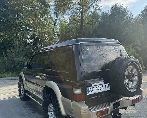 Зеленый Мицубиси Паджеро, объемом двигателя 3.5 л и пробегом 350 тыс. км за 5800 $, фото 4 на Automoto.ua