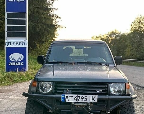 Зеленый Мицубиси Паджеро, объемом двигателя 2.97 л и пробегом 300 тыс. км за 5900 $, фото 4 на Automoto.ua