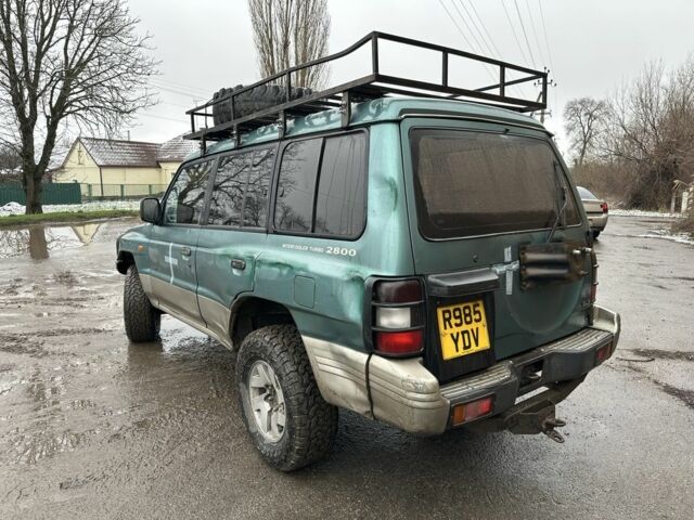 Зеленый Мицубиси Паджеро, объемом двигателя 2.8 л и пробегом 300 тыс. км за 4257 $, фото 2 на Automoto.ua