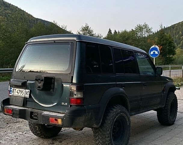 Зеленый Мицубиси Паджеро, объемом двигателя 2.97 л и пробегом 300 тыс. км за 5900 $, фото 3 на Automoto.ua