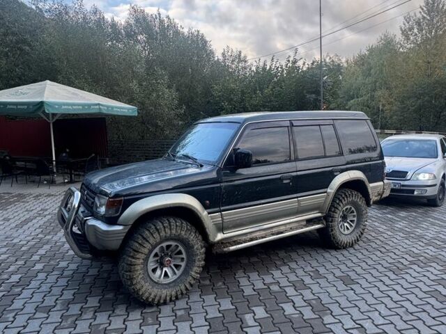 Зеленый Мицубиси Паджеро, объемом двигателя 3.5 л и пробегом 350 тыс. км за 5800 $, фото 1 на Automoto.ua