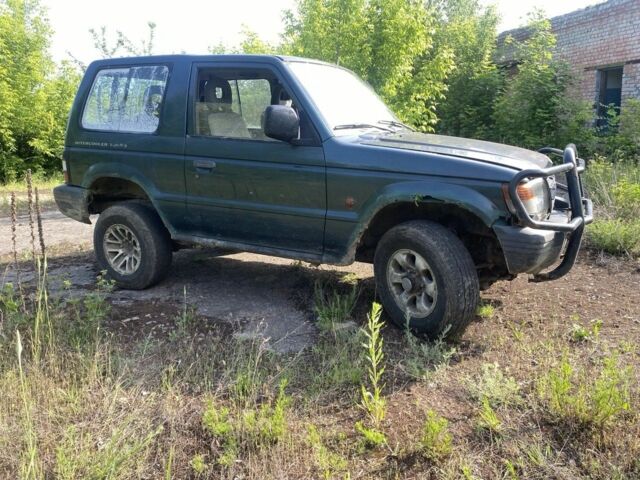 Зеленый Мицубиси Паджеро, объемом двигателя 2.5 л и пробегом 400 тыс. км за 3000 $, фото 2 на Automoto.ua