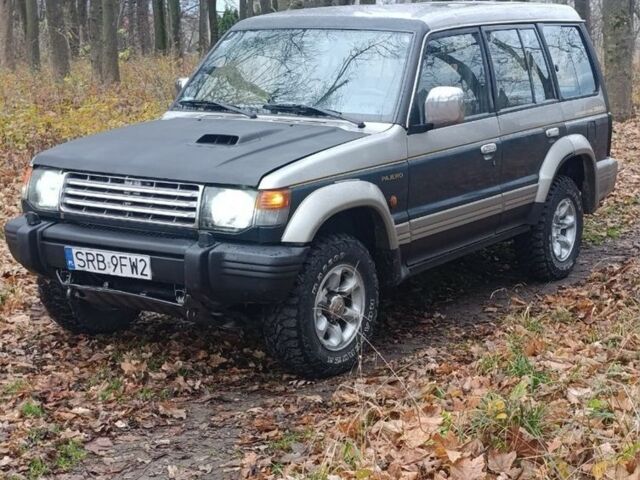Зелений Міцубісі Паджеро, об'ємом двигуна 2 л та пробігом 350 тис. км за 3500 $, фото 14 на Automoto.ua