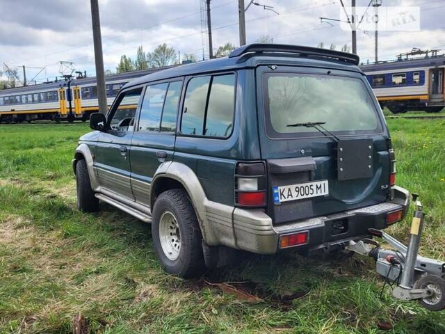 Зелений Міцубісі Паджеро, об'ємом двигуна 3 л та пробігом 310 тис. км за 6900 $, фото 10 на Automoto.ua