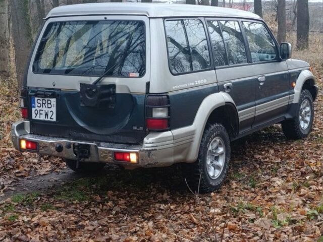 Зелений Міцубісі Паджеро, об'ємом двигуна 2 л та пробігом 350 тис. км за 3500 $, фото 13 на Automoto.ua