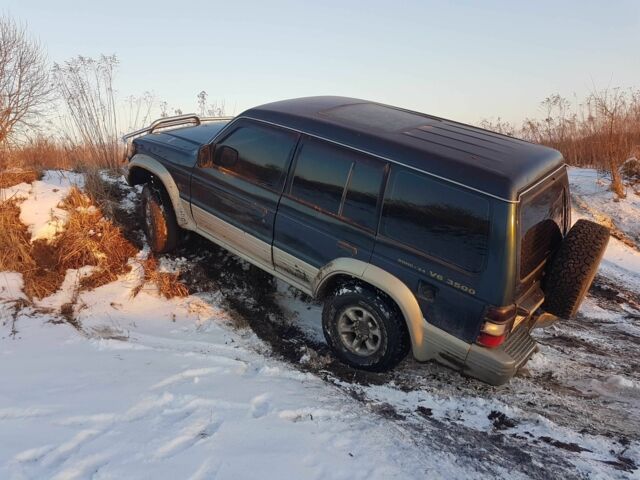 Зелений Міцубісі Паджеро, об'ємом двигуна 0.35 л та пробігом 360 тис. км за 5500 $, фото 2 на Automoto.ua