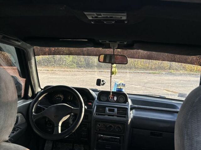 Зелений Міцубісі Паджеро, об'ємом двигуна 2.5 л та пробігом 350 тис. км за 3100 $, фото 9 на Automoto.ua
