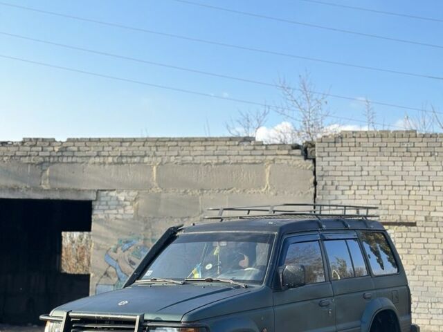 Зелений Міцубісі Паджеро, об'ємом двигуна 2.5 л та пробігом 350 тис. км за 3100 $, фото 2 на Automoto.ua