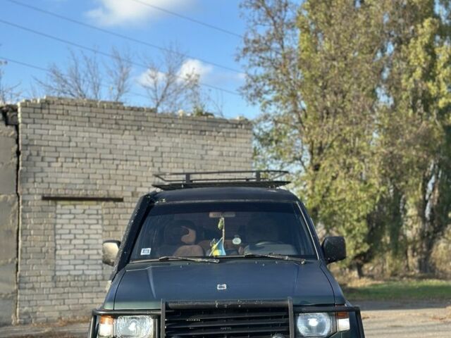 Зелений Міцубісі Паджеро, об'ємом двигуна 2.5 л та пробігом 350 тис. км за 3100 $, фото 1 на Automoto.ua
