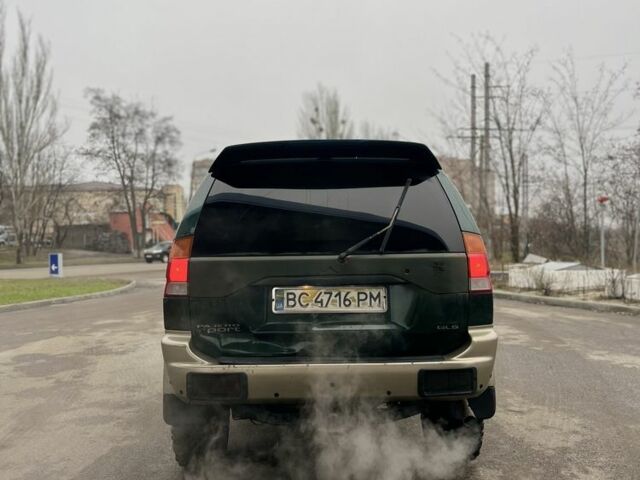 Зеленый Мицубиси Паджеро, объемом двигателя 3 л и пробегом 200 тыс. км за 3700 $, фото 4 на Automoto.ua