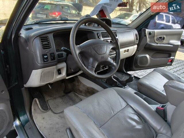 Зеленый Мицубиси Паджеро, объемом двигателя 2.5 л и пробегом 274 тыс. км за 6200 $, фото 4 на Automoto.ua