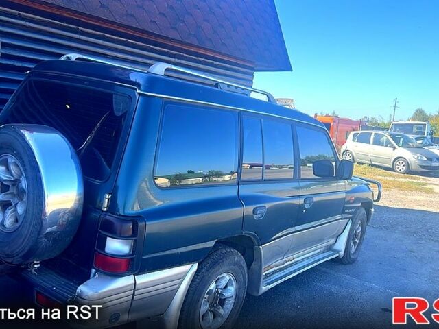 Зелений Міцубісі Паджеро, об'ємом двигуна 3.5 л та пробігом 220 тис. км за 4400 $, фото 2 на Automoto.ua