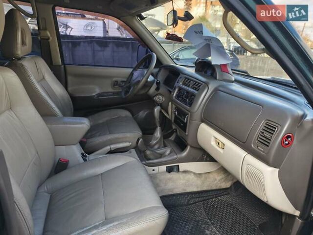 Зеленый Мицубиси Паджеро, объемом двигателя 2.5 л и пробегом 274 тыс. км за 6200 $, фото 7 на Automoto.ua