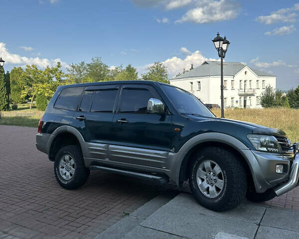 Зеленый Мицубиси Паджеро, объемом двигателя 3.5 л и пробегом 260 тыс. км за 9150 $, фото 51 на Automoto.ua