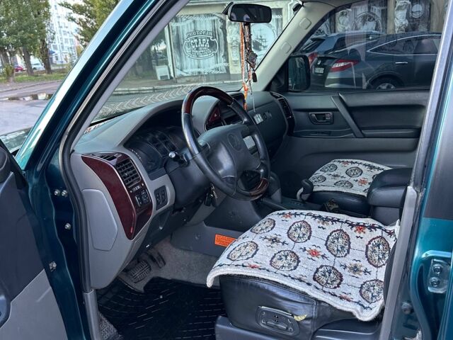 Зелений Міцубісі Паджеро, об'ємом двигуна 3.5 л та пробігом 341 тис. км за 6300 $, фото 6 на Automoto.ua