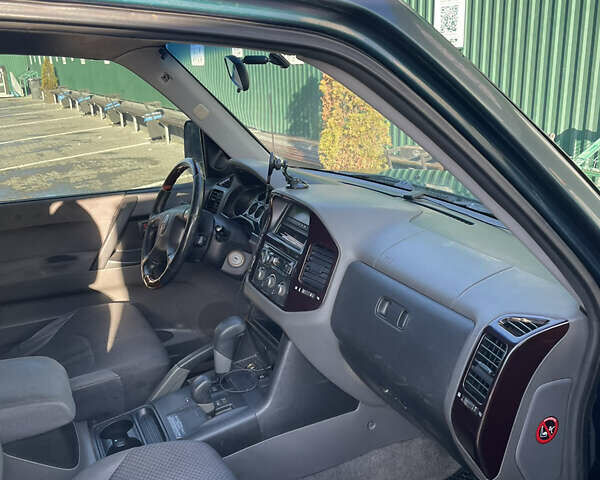 Зеленый Мицубиси Паджеро, объемом двигателя 3.2 л и пробегом 255 тыс. км за 7000 $, фото 5 на Automoto.ua