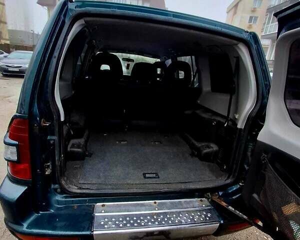 Зеленый Мицубиси Паджеро, объемом двигателя 3.2 л и пробегом 425 тыс. км за 6500 $, фото 5 на Automoto.ua