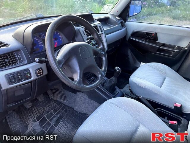 Зеленый Мицубиси Паджеро, объемом двигателя 1.8 л и пробегом 310 тыс. км за 5500 $, фото 6 на Automoto.ua