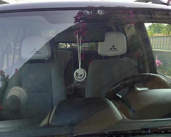 Зелений Міцубісі Паджеро, об'ємом двигуна 1.8 л та пробігом 205 тис. км за 5800 $, фото 17 на Automoto.ua